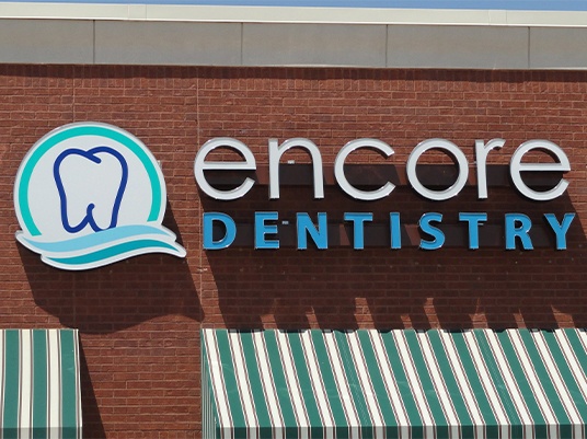 Encore Dentistry store sign