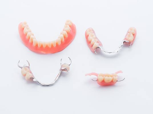 Dentures and partials to replace missing teeth