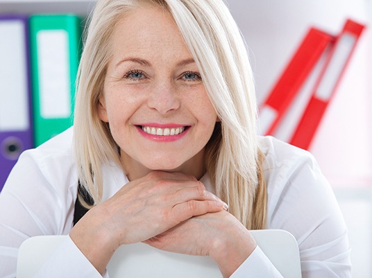 Woman with dentures smiling