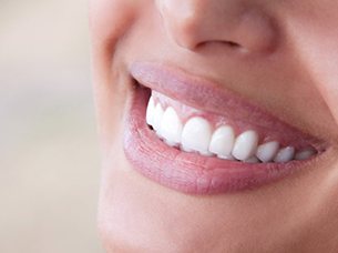 Closeup of beautiful healthy teeth unaffected by dental emergencies