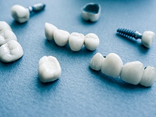 Dental implants in Arlington on blue background