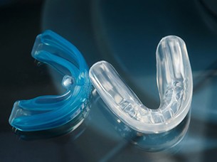 Closeup of mouthguard that protect dental implants in Arlington 
