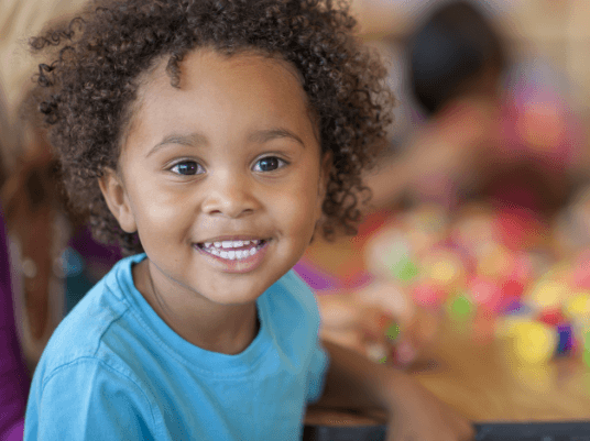 young boy smiling