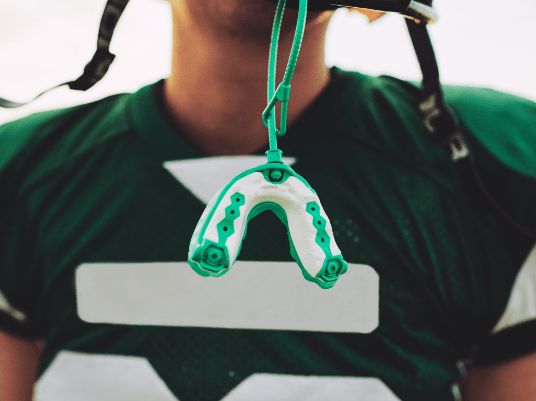 mouthguard hanging on helmet