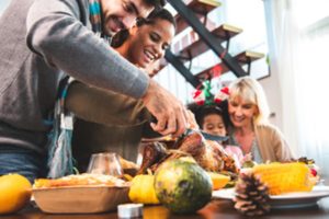 A family celebrating the holidays with food