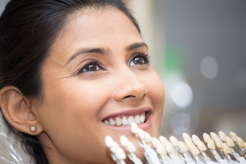 Dentist color-matching teeth