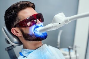 Man getting a professional whitening treatment