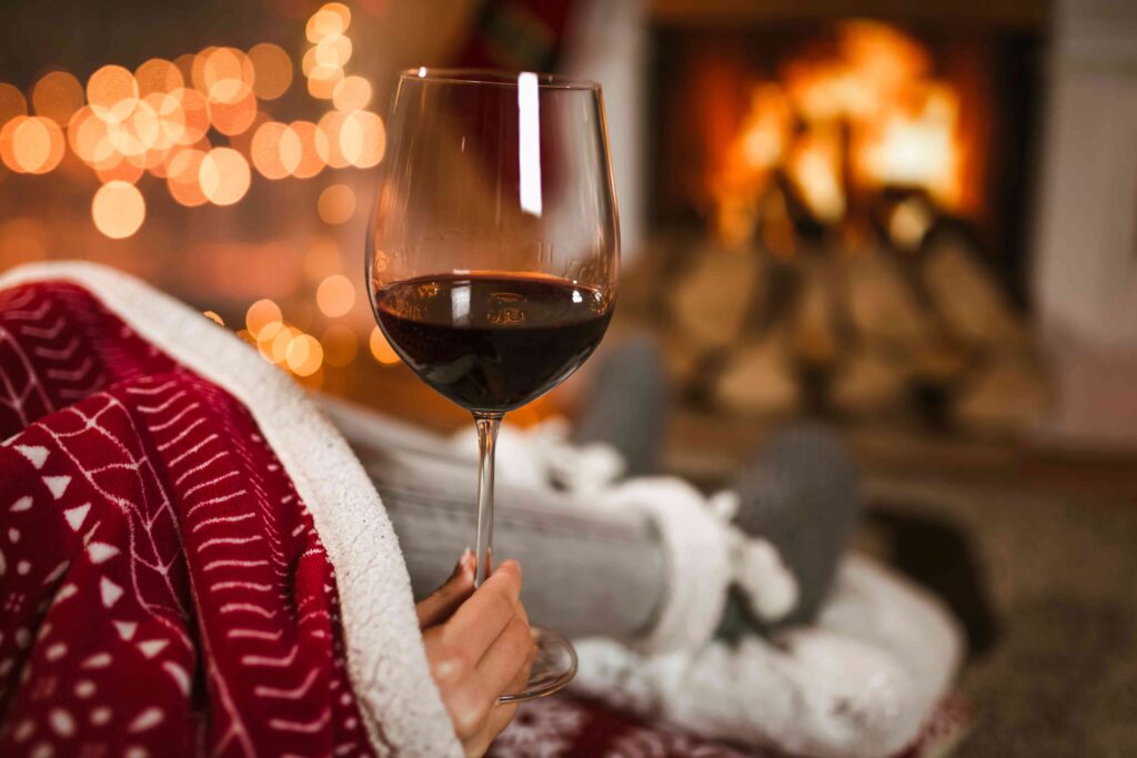 Woman holding a glass of red wine